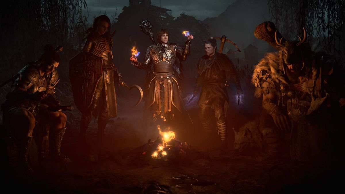 Le cinque classi di personaggi di Diablo 4 che gironzolano attorno a un fuoco, con un barbaro a sinistra, un negromante, uno stregone, un ladro e il druido all'estrema destra