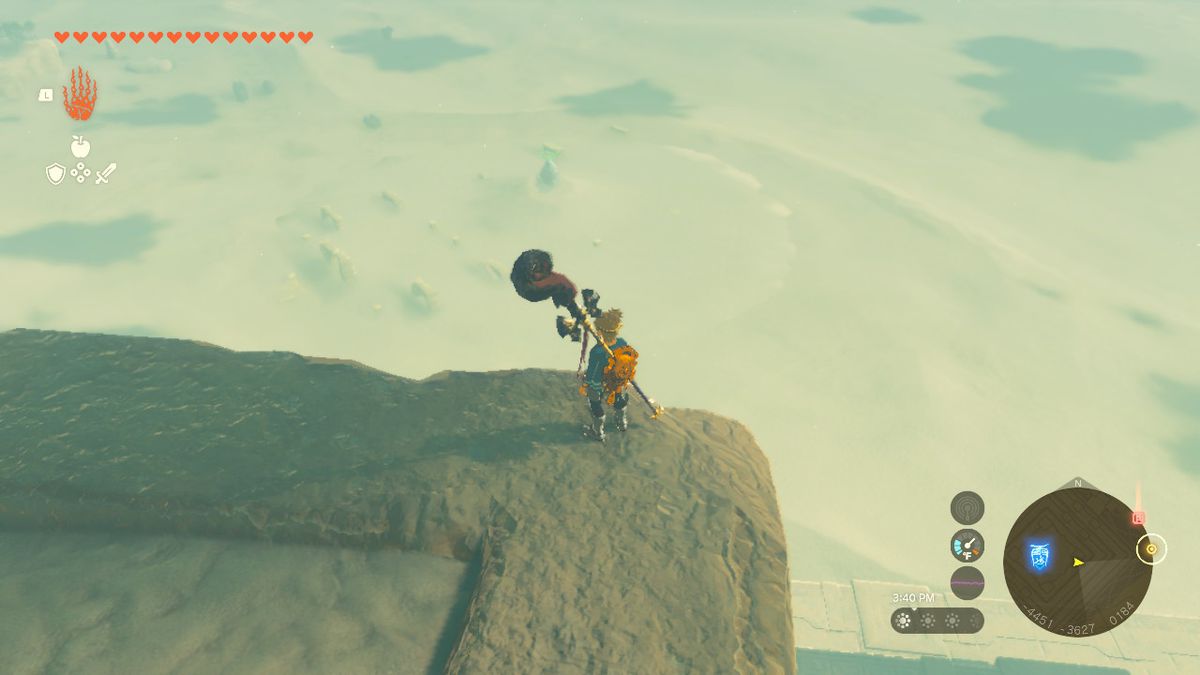 Link in piedi in cima al Tempio del Fulmine in Zelda: TOTK, guardando un santuario