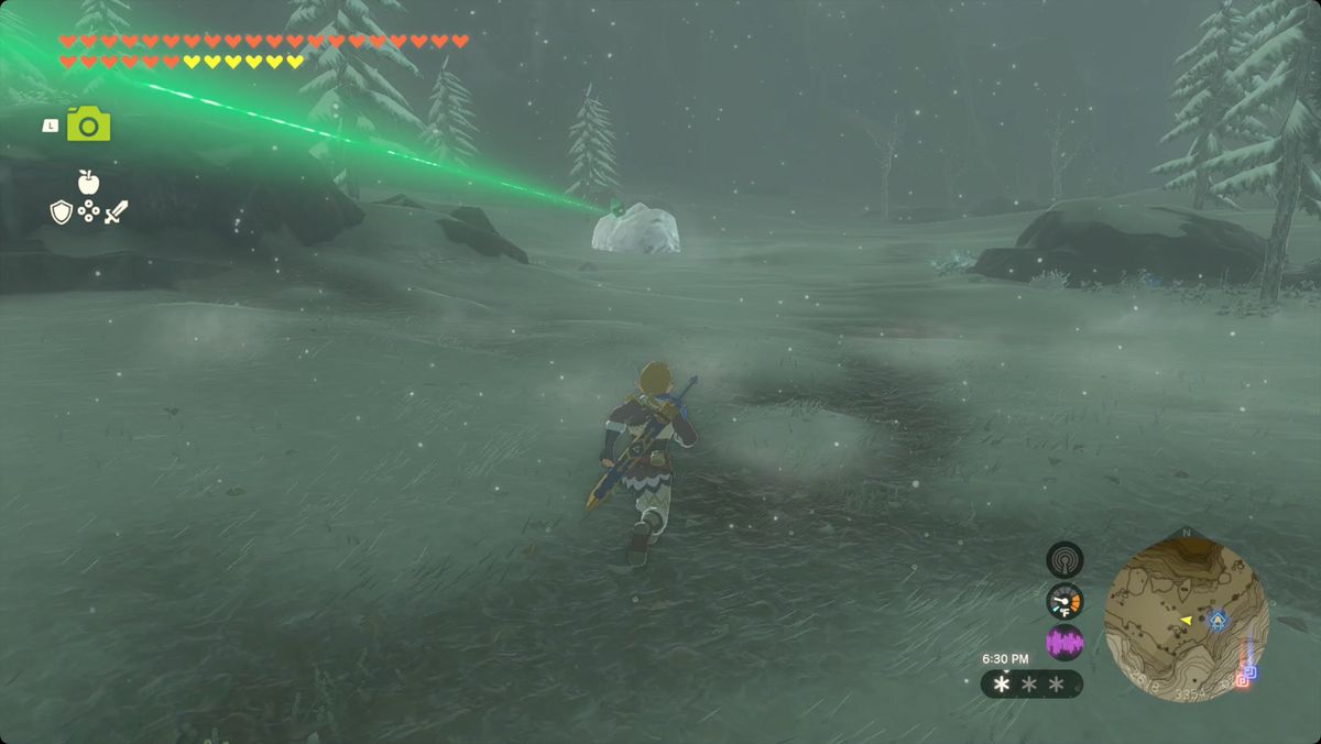 The Legend of Zelda: Tears of the Kingdom Link seguendo il raggio verde fino al cristallo dei monti Hebra settentrionale.