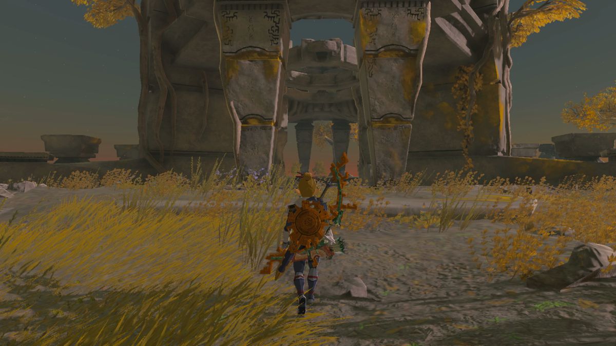 Link in Tears of the Kingdom cammina verso una struttura su un'isola del cielo.