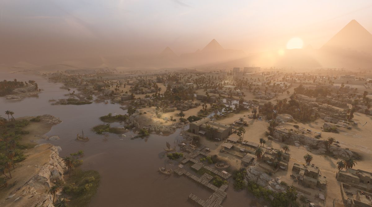 La città di Menfi, durante l'età del bronzo in Egitto, al tramonto, con le palme lungo il Nilo e un vertiginoso labirinto di strade cittadine in Total War: Pharaoh